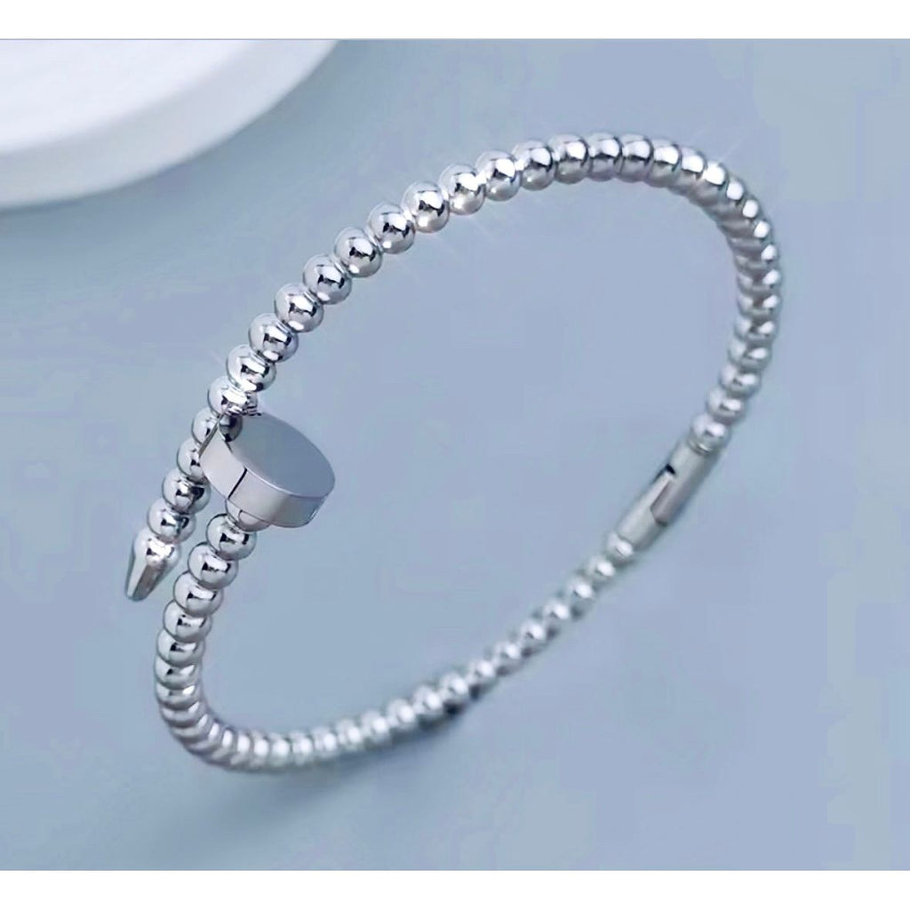 Silver Jagged Nail Bracelet